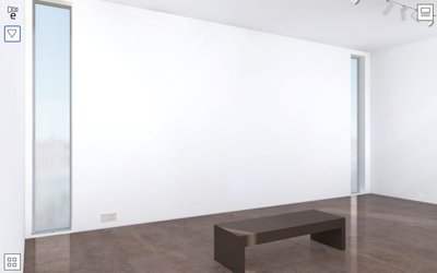 The gallery has a chocolate tinted, low sheen, stone floor and a simple wooden bench that imparts scale with a minimum of fuss.